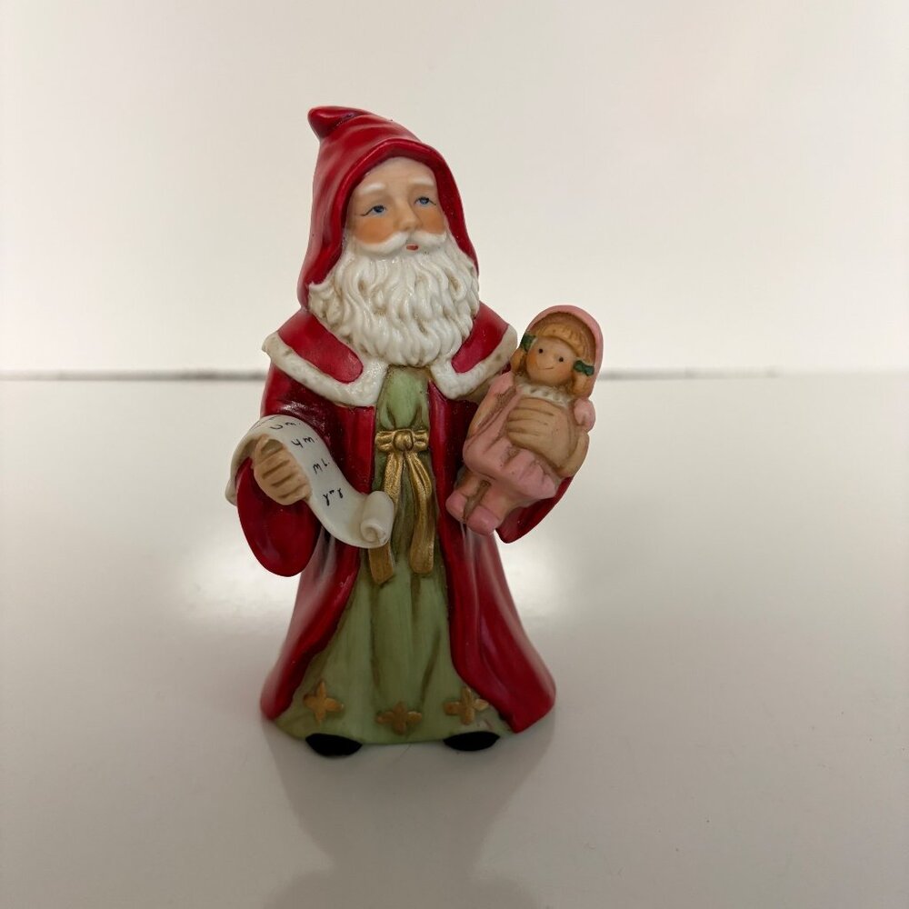 Homco Santa Claus Figurine Holding Doll #5610 Collectible Holiday Decor